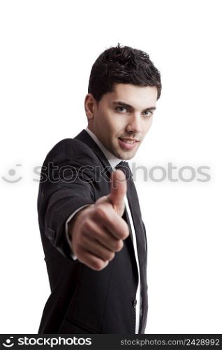 Young businessman with thumbs up isolated over a white background 