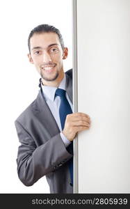 Young businessman with white board