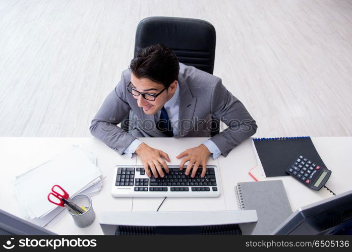 Young businessman working at his desk