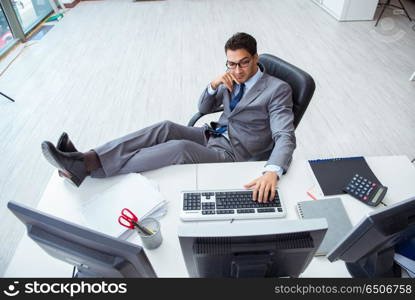 Young businessman working at his desk