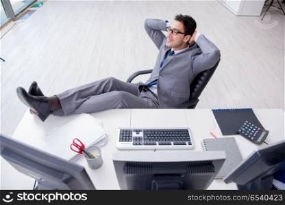 Young businessman working at his desk