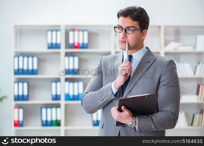 Young businessman working in the office