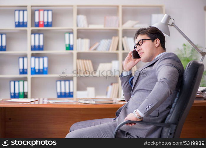 Young businessman working in the office