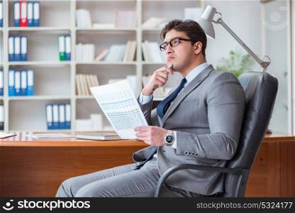 Young businessman working in the office