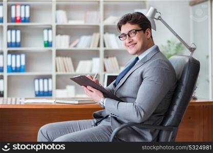 Young businessman working in the office
