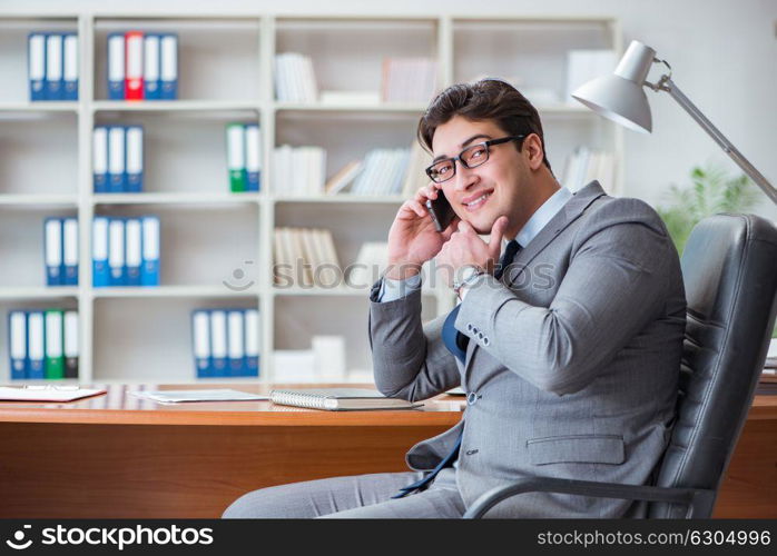 Young businessman working in the office