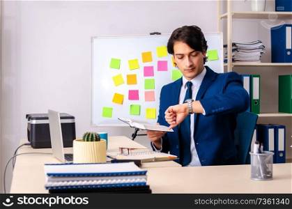 Young businessman working in the office 