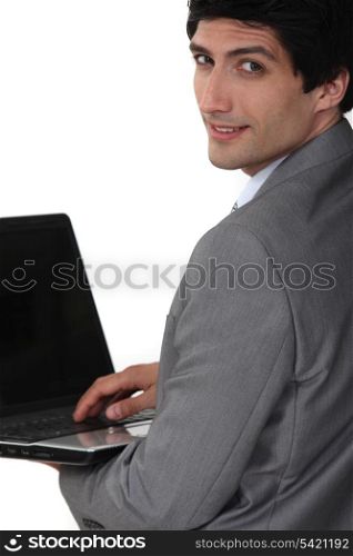 Young businessman working on notebook