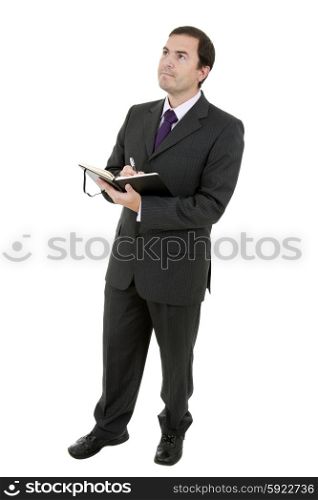 young businessman writing in a book in white background
