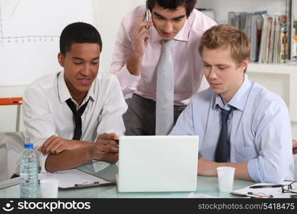 Young businessmen with a laptop