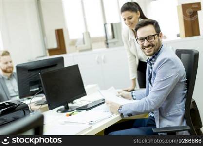 Young businesspeople working in modern office