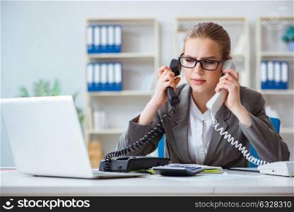 Young businesswoman accountant working in the office