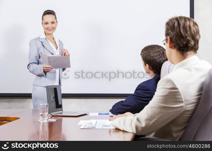 Young businesswoman giving a presentation to her colleagues. I have some fresh ideas