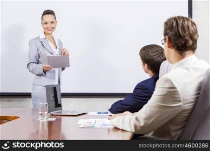 Young businesswoman giving a presentation to her colleagues. I have some fresh ideas