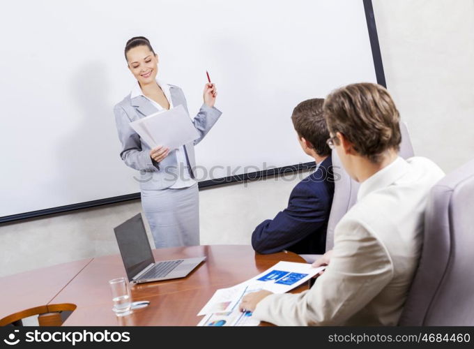 Young businesswoman giving a presentation to her colleagues. I have some fresh ideas