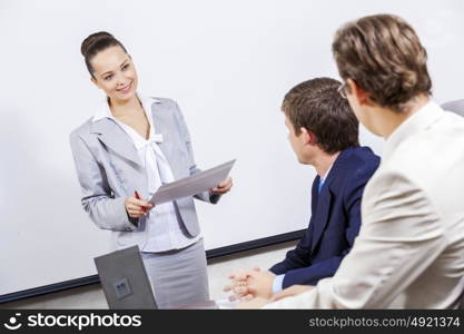 Young businesswoman giving a presentation to her colleagues. I have some fresh ideas