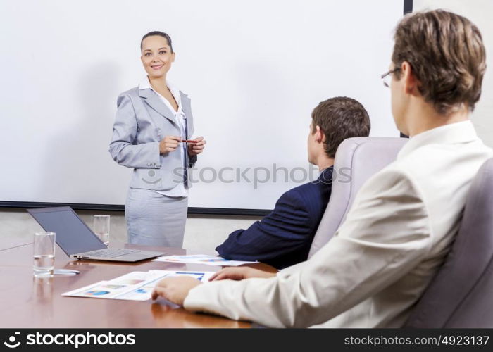 Young businesswoman giving a presentation to her colleagues. I have some fresh ideas