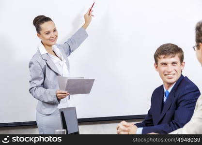 Young businesswoman giving a presentation to her colleagues. I have some fresh ideas