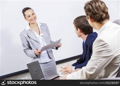 Young businesswoman giving a presentation to her colleagues. I have some fresh ideas