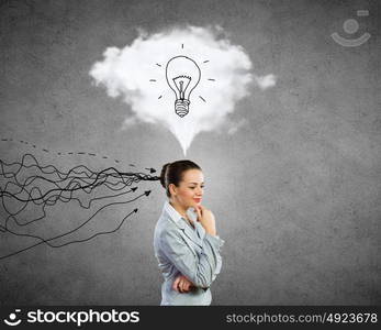 Young businesswoman has an idea. Young thoughtful woman and ideas coming out of her head