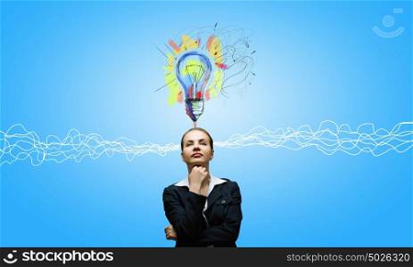 Young businesswoman has an idea. Young thoughtful woman and ideas coming out of her head