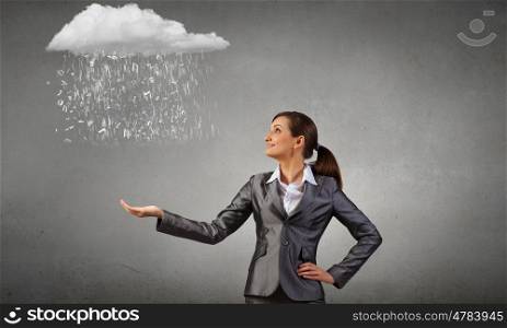 Young businesswoman holding white cloud in hands. Woman hold cloud