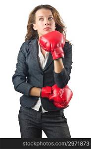 Young businesswoman in boxing concept