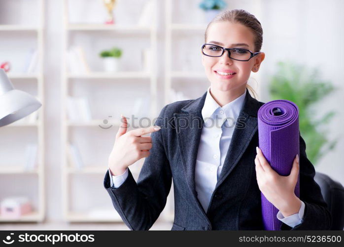 Young businesswoman in healthy lifestyle concept