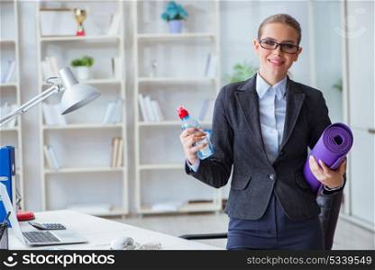 Young businesswoman in healthy lifestyle concept