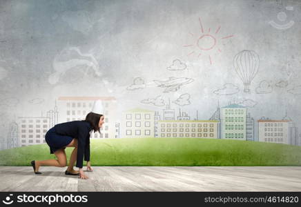 Young businesswoman in paper crown running in a hurry