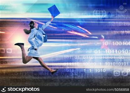 Young businesswoman in suit running at full pelt. Full speed businesswoman