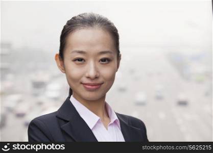 Young Businesswoman Looking at Camera