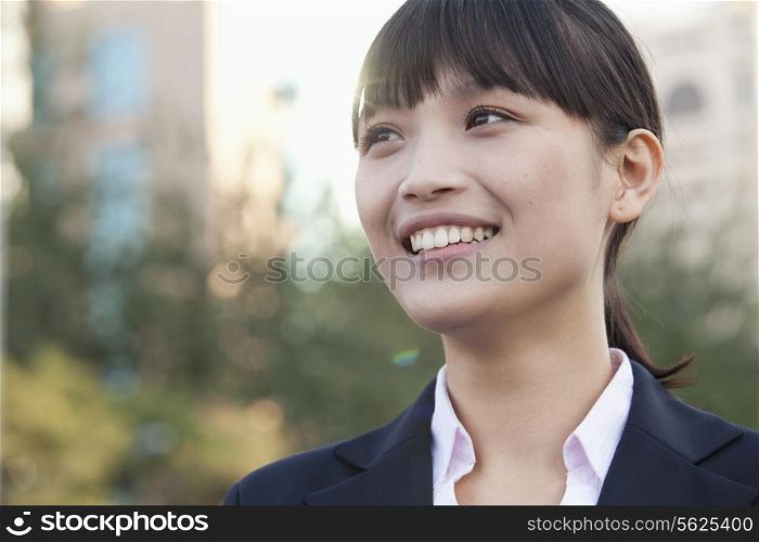 Young Businesswoman Looking away