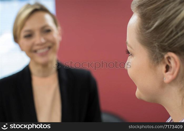 Young Businesswoman Meeting With Female Mentor In Office