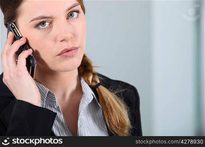 Young businesswoman on the phone.
