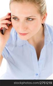 Young businesswoman on the phone on white background