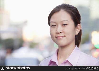 Young Businesswoman outside in Beijing, portrait