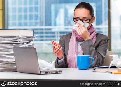 Young businesswoman sick in the office