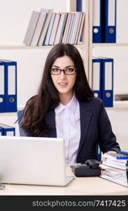 Young businesswoman sitting in the office 