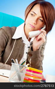 Young businesswoman talking on the phone