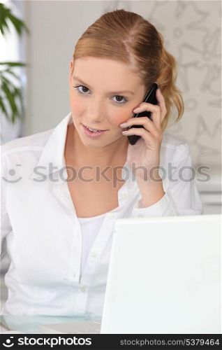 young businesswoman talking on the phone