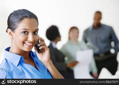 Young Businesswoman Using Cell Phone