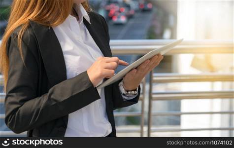 young businesswoman using digital tablet