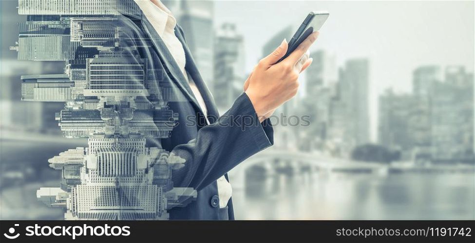 Young businesswoman using mobile phone with modern city buildings background. Future telecommunication technology and internet of things ( IOT ) concept.. Mobile Phone Telecommunication Technology Concept
