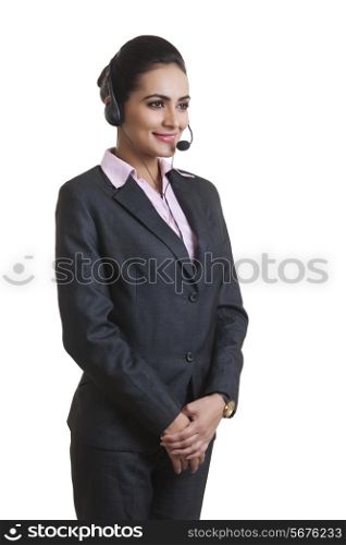 Young businesswoman wearing headset isolated over white background