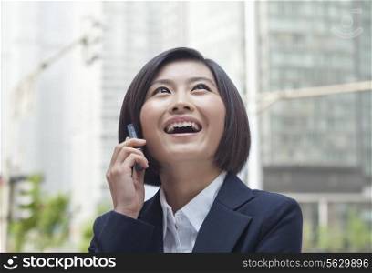 Young Businesswoman with Cell Phone