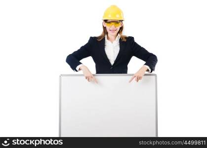 Young businesswoman with hard hat and blank board isolated on white