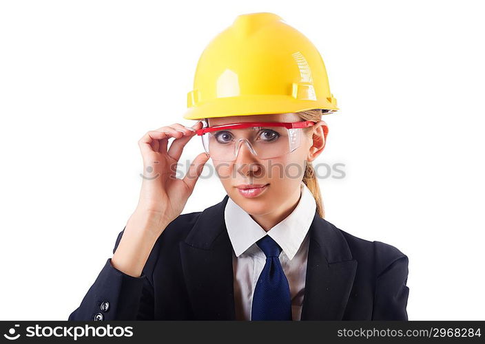 Young businesswoman with hard hat on white