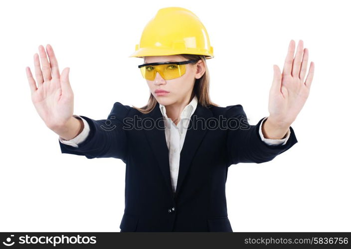 Young businesswoman with hard hat on white