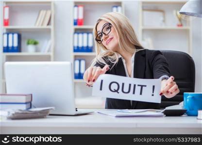 Young businesswoman with message in the office